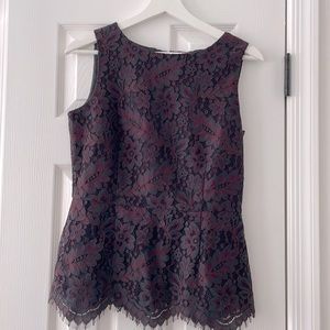 Beautiful Brooks Brothers sleeveless blouse can be worn with a suit or jeans